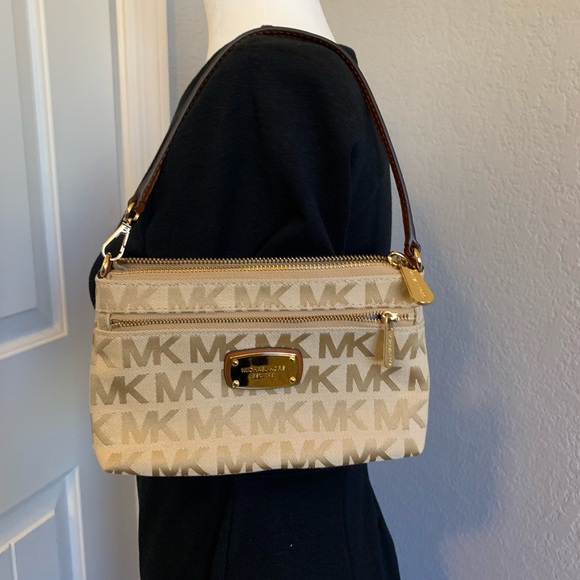 Michael Kors Handbags - Signature Michael Kors Wristlet/ gold accents